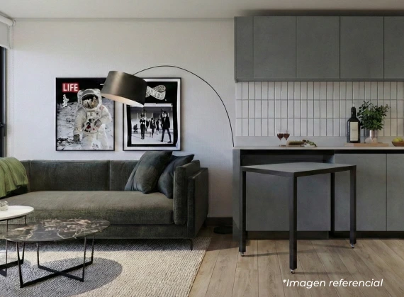 Cocina integrada con mesón movible y espacio optimizado en departamento de Pilares.