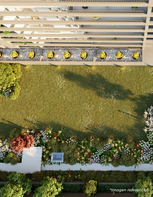 Vista aérea de áreas verdes en proyecto inmobiliario en Santiago.