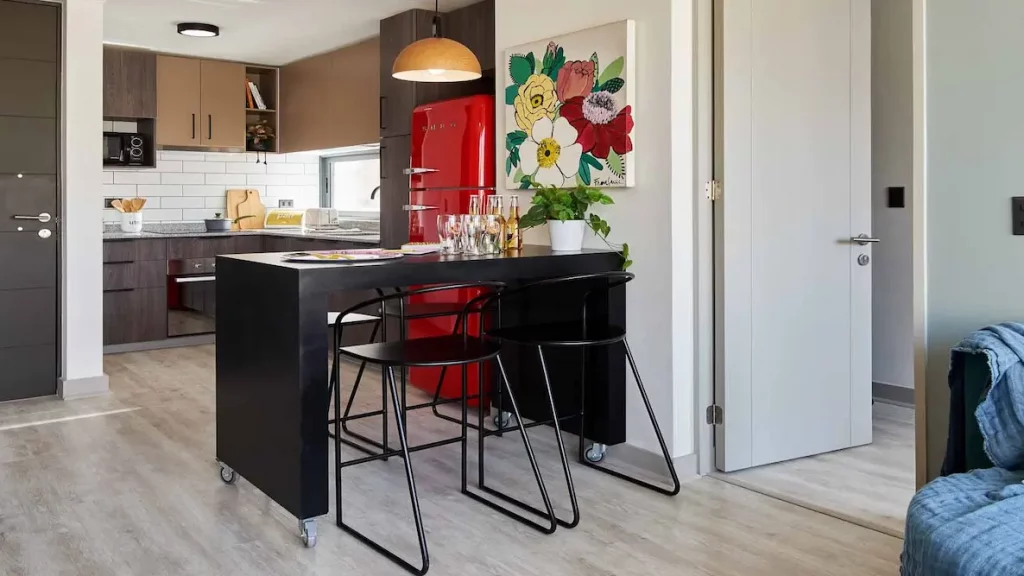 Departamento con cocina abierta de proyecto Centro Urbano Santos Dumont de Inmobiliaria Pilares